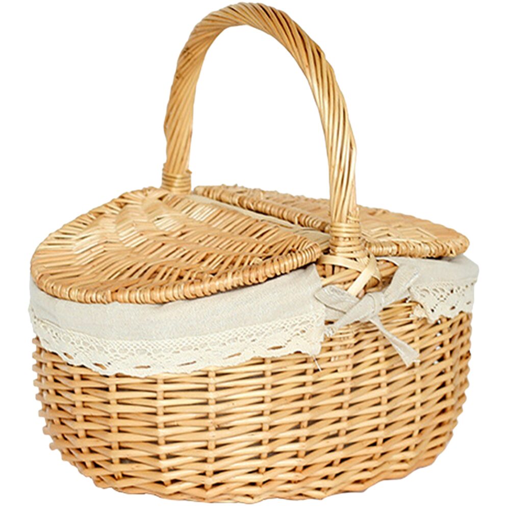 Photo d'un panier pique-nique en osier avec des rabats et une seule anse.